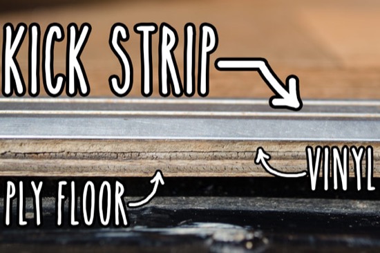 Kick strip on floor edge around entrance