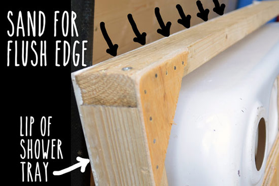 Sanding shower tray edges flush with frame