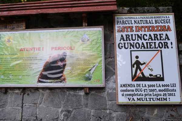Yes! Bear signs. This is what I want. I think it says something about not leaving litter because a bear will come and fight you⦠?