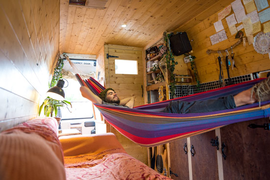 hammock-in-van-thinking-about-the-road-vanlife