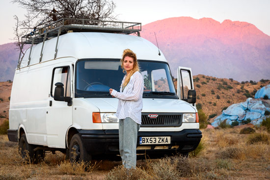 vanlife-leah-shann-in-morocco-blue-rocks-sunset