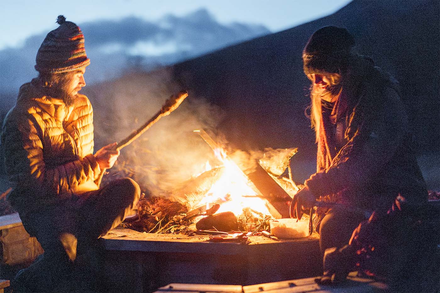 making food by campfire