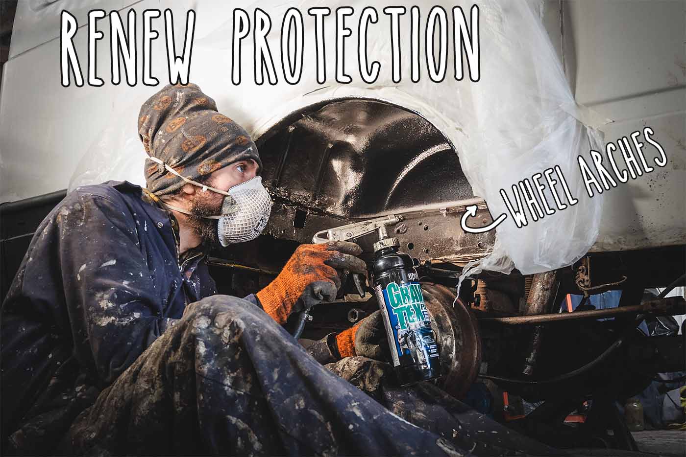 spraying Gravitex stonechip to campervan wheelarches