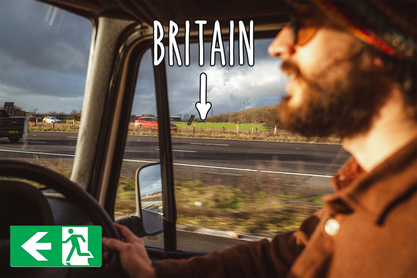 man driving campervan on motorway leaving the UK