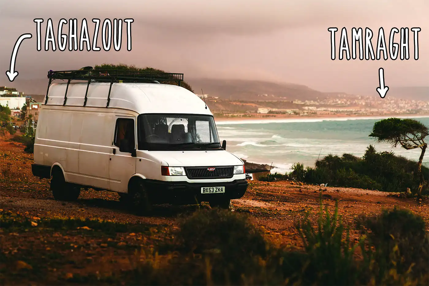 campervan in Taghazout with tamraght in the background