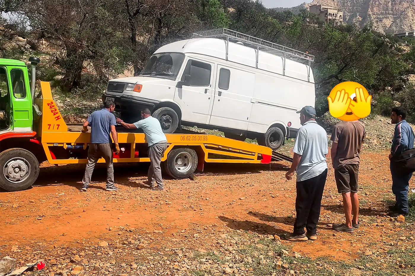 campervan being loaded onto recovery truck